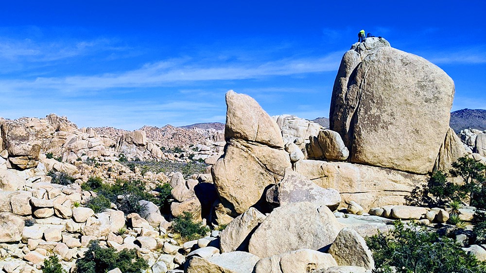 Rock climber in Hidden Valley, Joshua Tree National Park, California