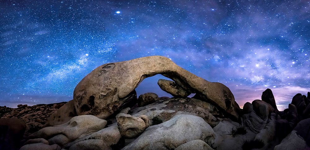 Rock climber in Hidden Valley, Joshua Tree National Park, California