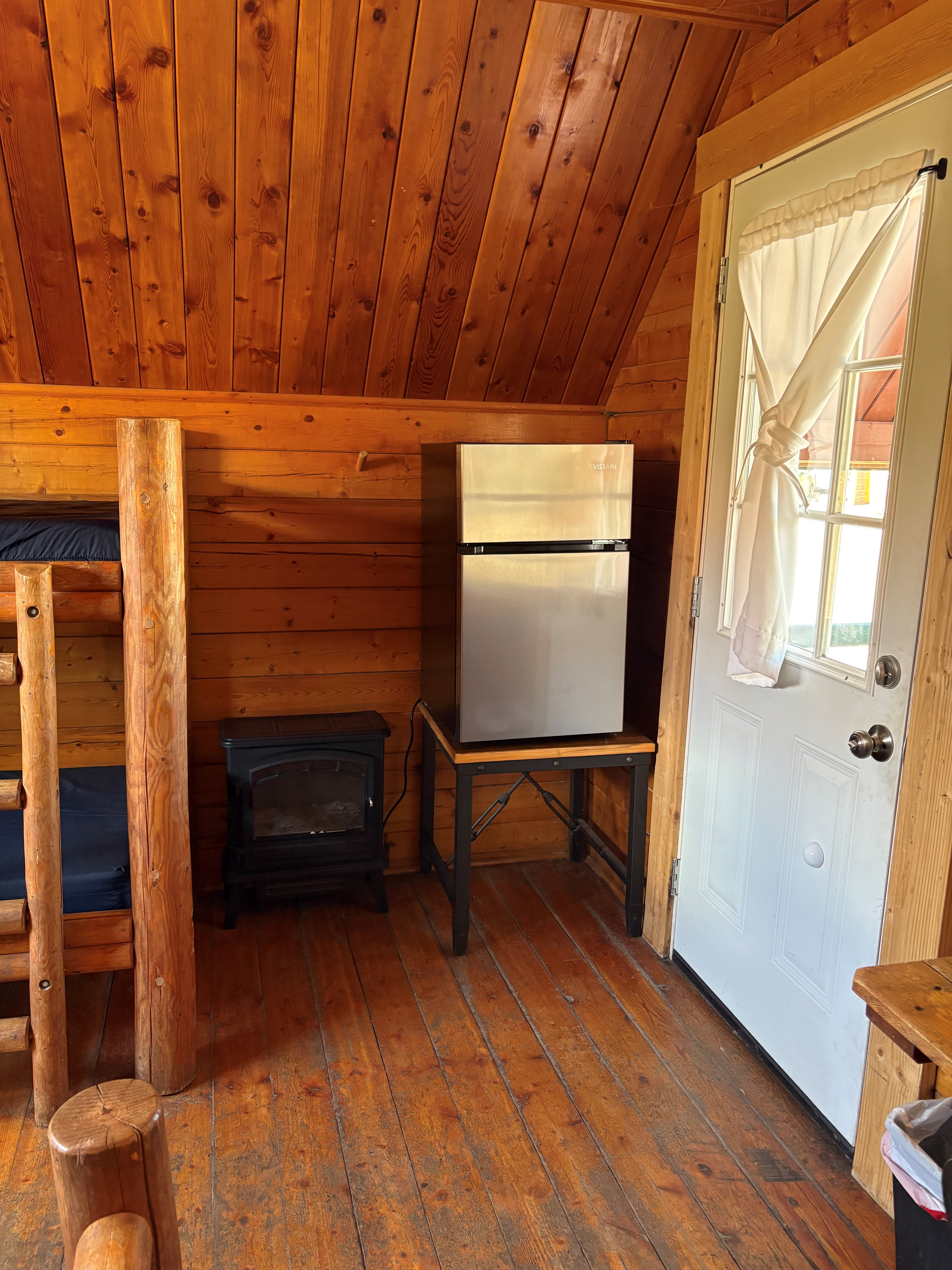 Air conditioning, heater, college size refrigerator and freezer