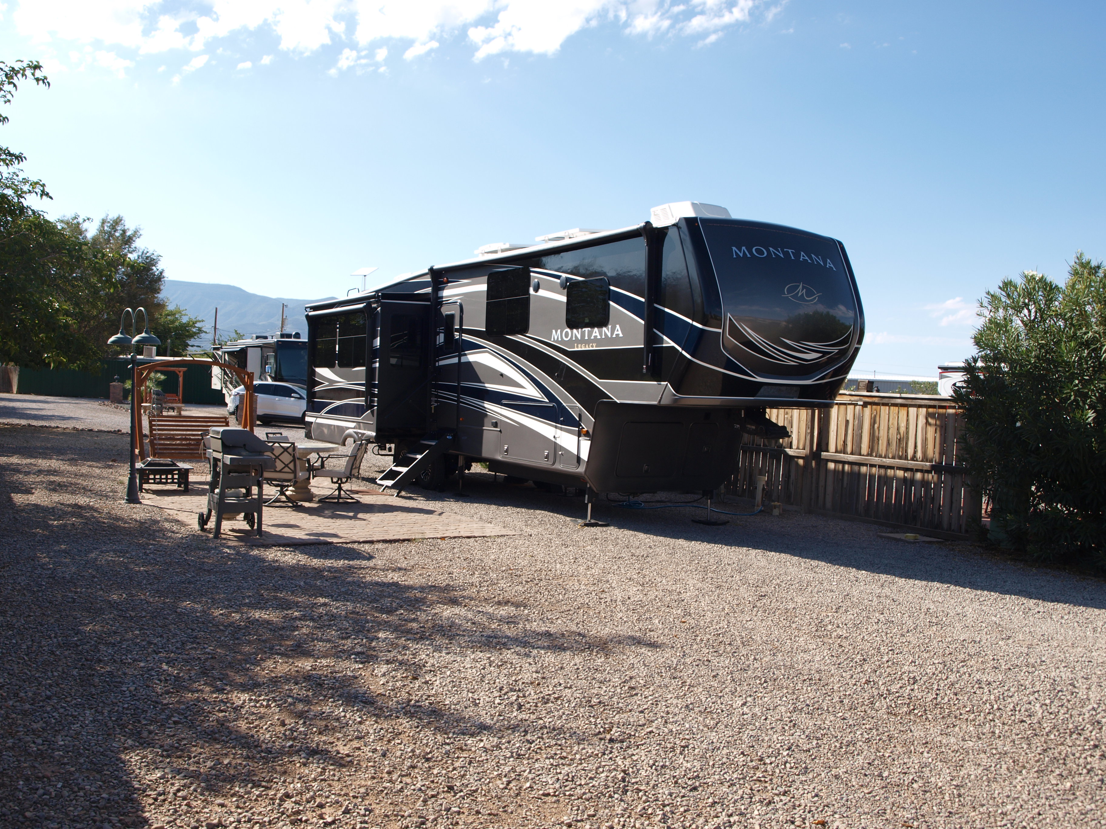 50/30amp pull thru patio site.  Electric, water, sewer and cable tv.  Gas grill and fire pit.
