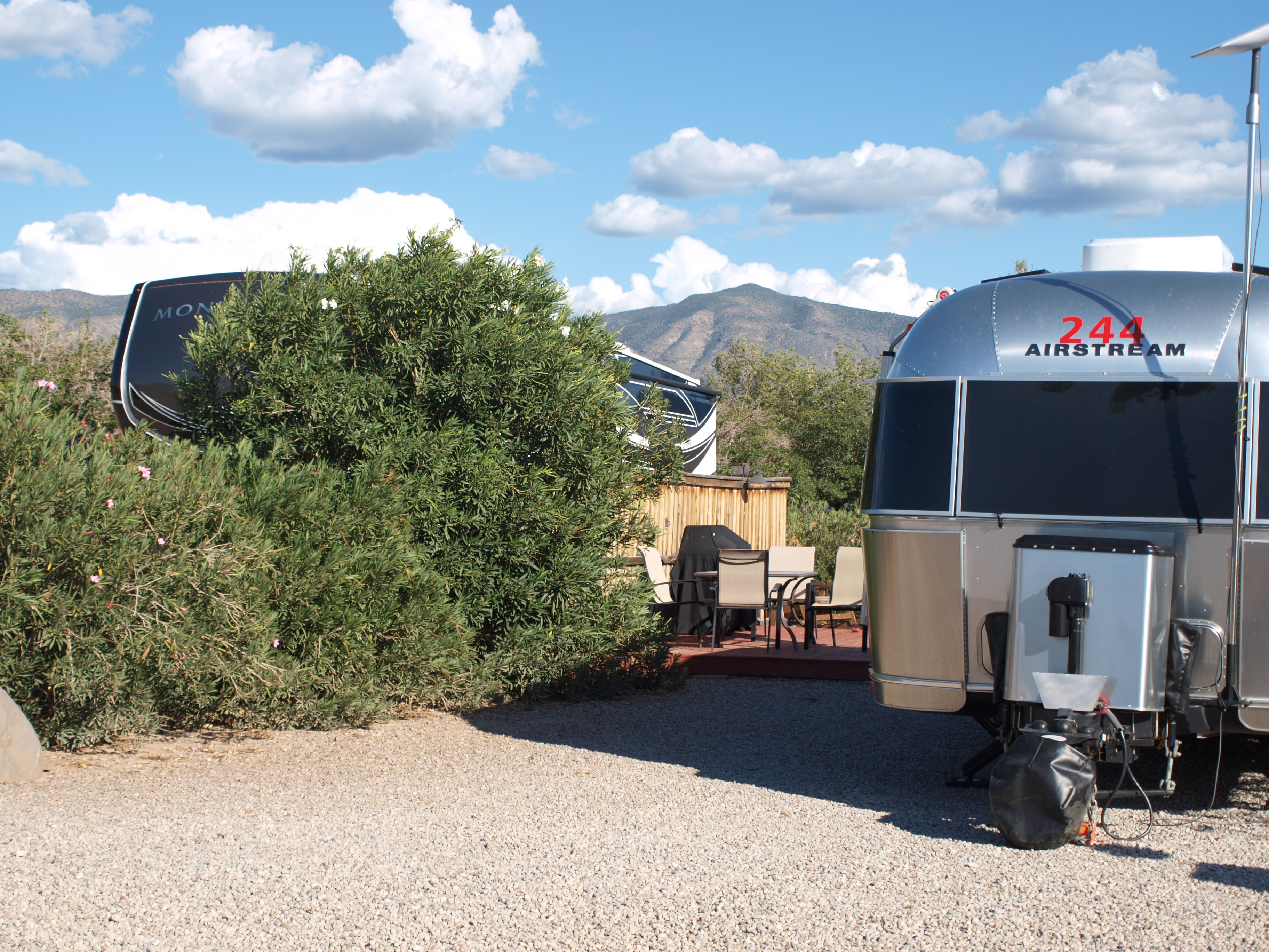 50/30amp pull thru patio site.  Electric, water, sewer and cable tv.  Gas grill and fire pit.