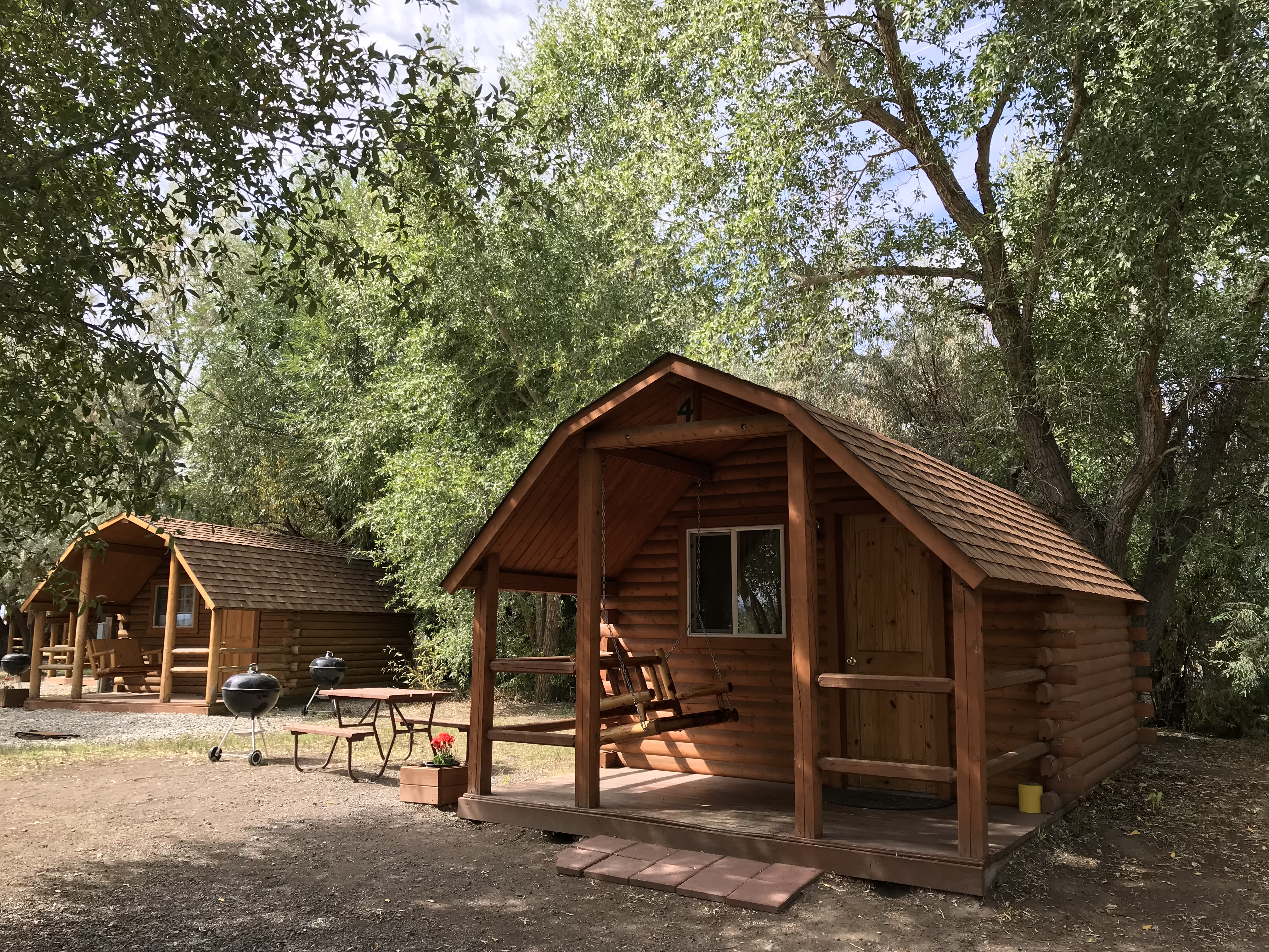All cabins have a front porch with a swing.