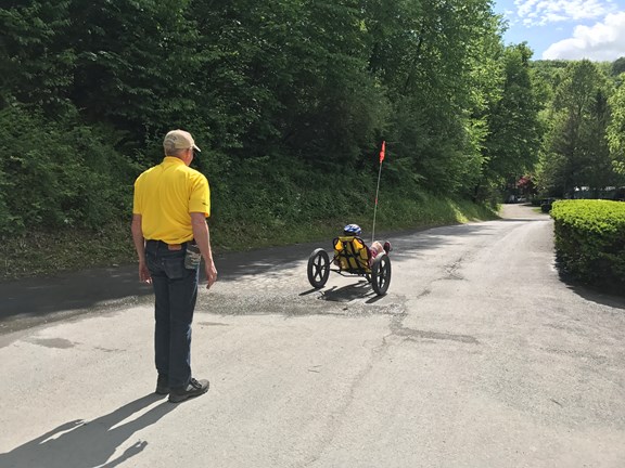 Owner helping a Banana Bike rider
