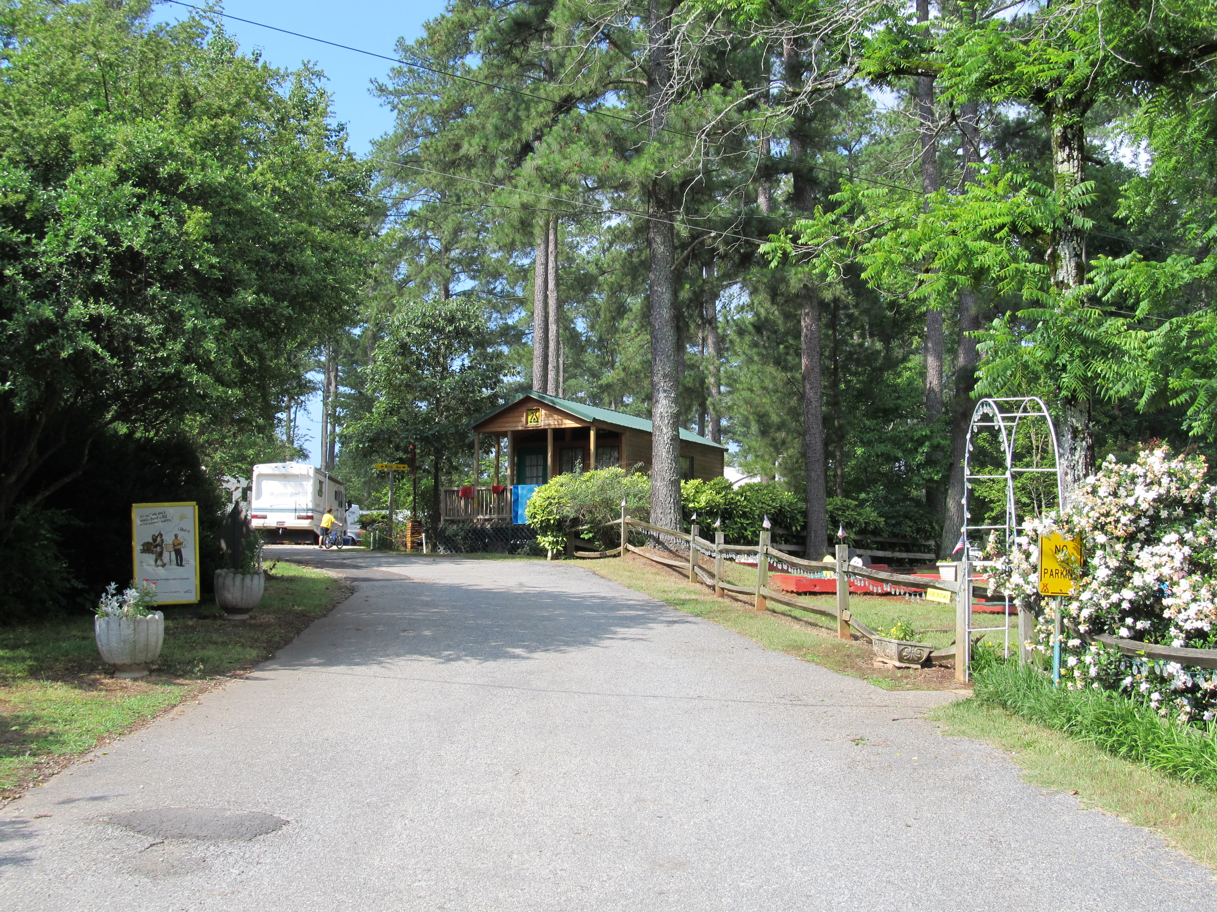 "Main St" into campground with Deluxe Cabin-Park Model on the right