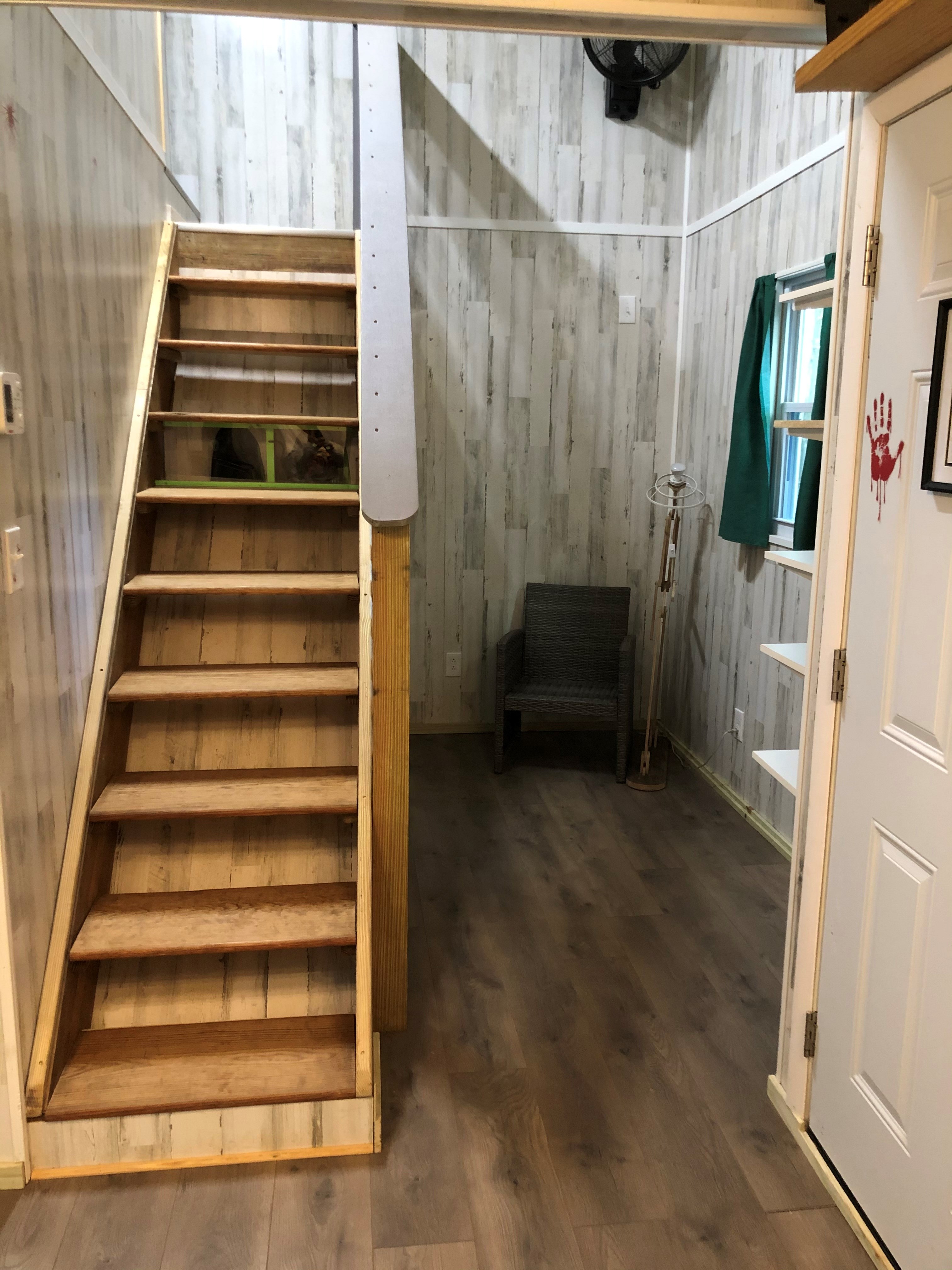 K9 Haunted Cabin steps to loft sleeping area.