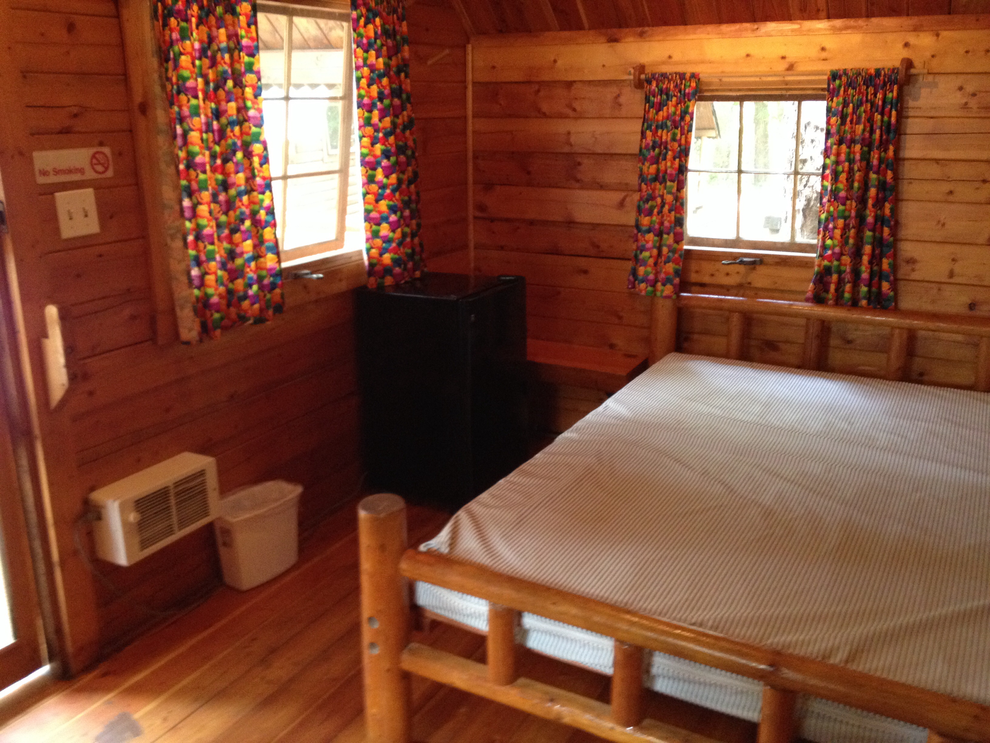 2-Room Camping Cabin Interior Front Room with cable TV,  Mini-refrig and full size bed (K06).