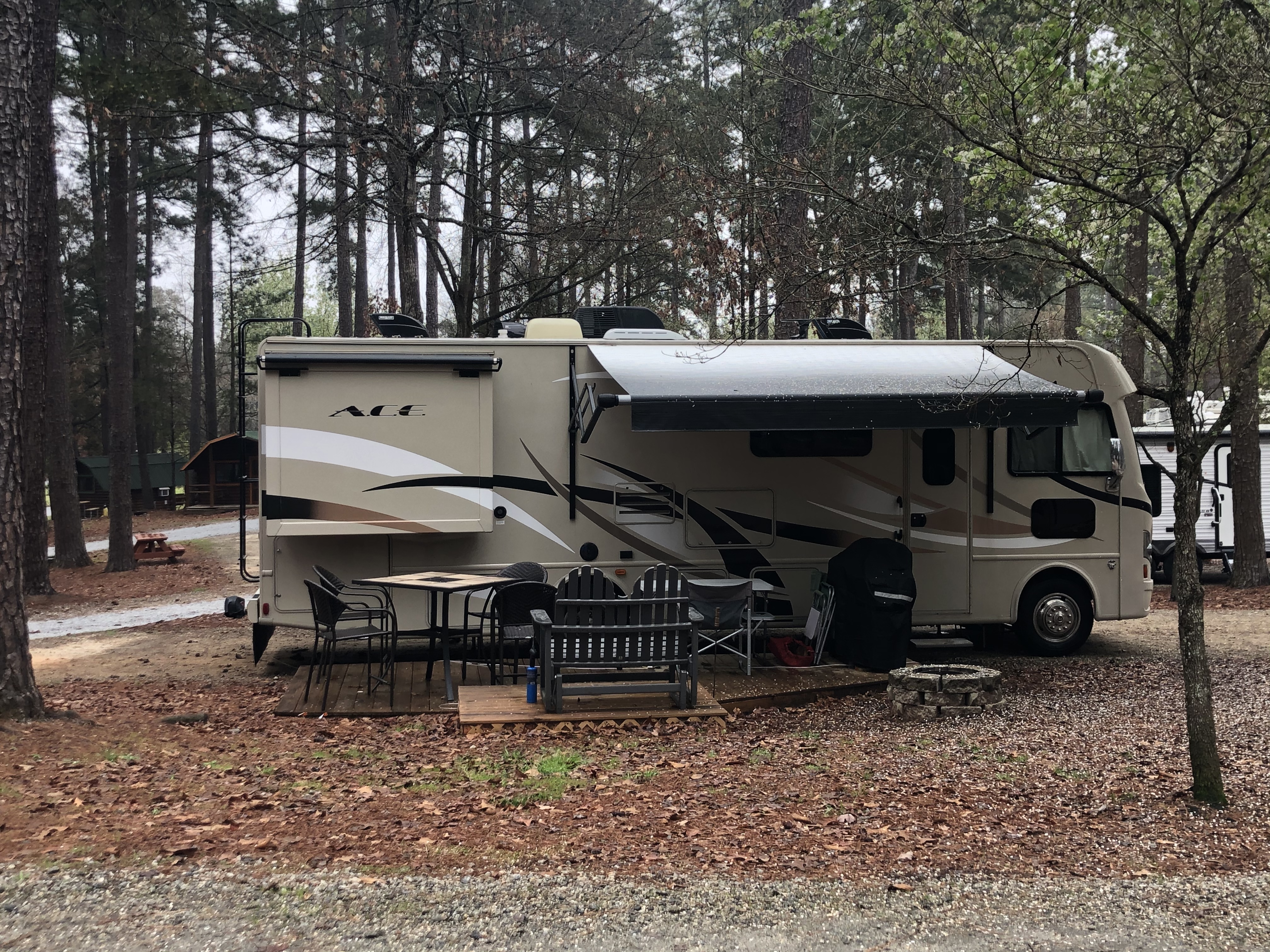 30 amp patio site with gas grill and glider in addition to the dining table with umbrella during the warmer months.