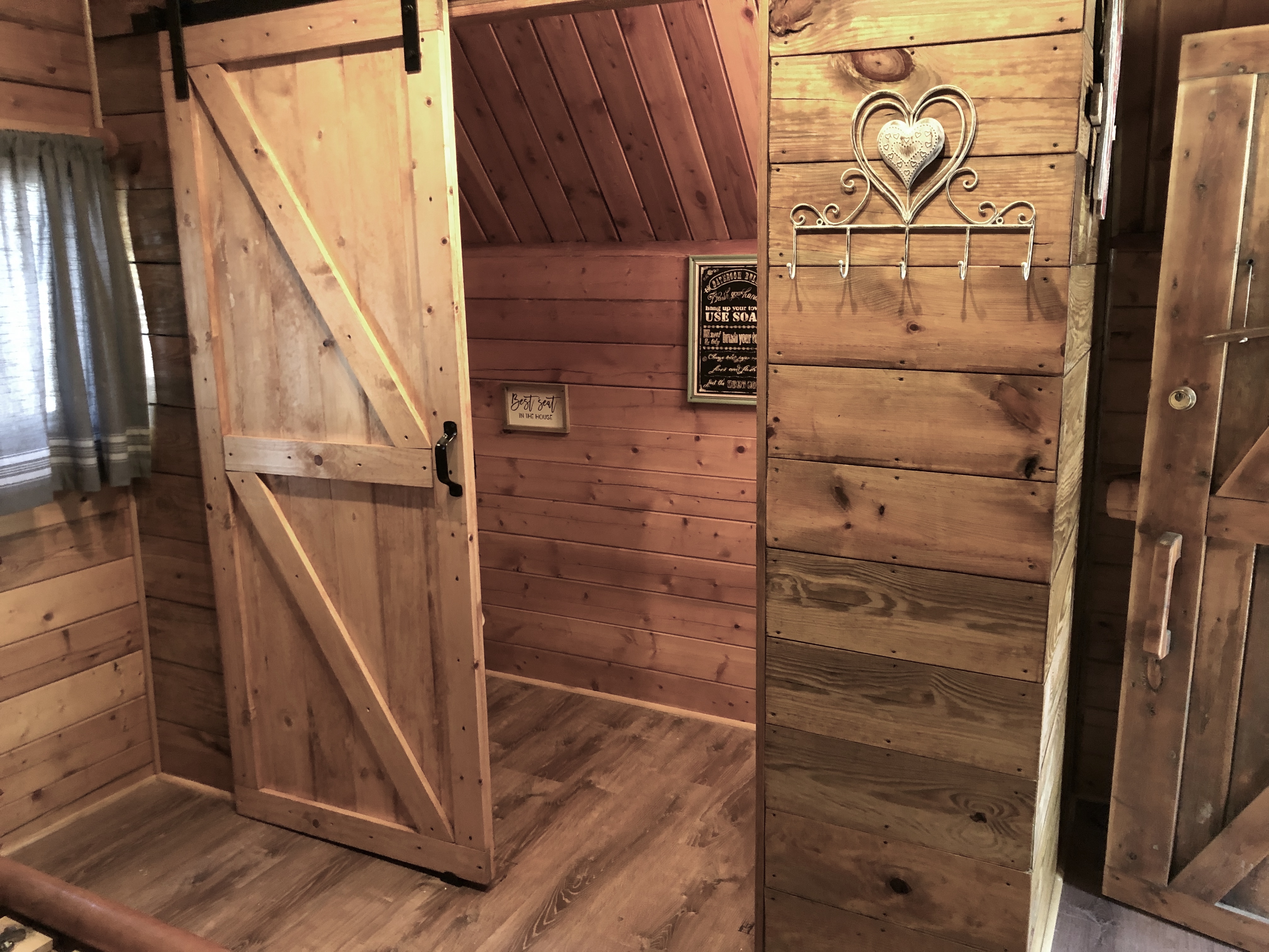 Bathroom with toilet/sink in one-room Cuddle Cabin