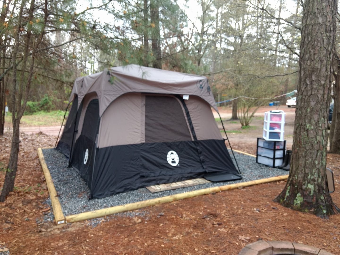 Premium Tent Site with 16x16 Tent Pad, Switchable On/Off light, Receptacle, Water and Picnic Table with Umbrella