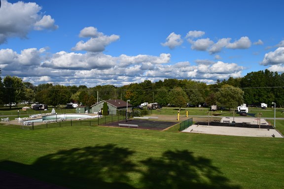 Warm sunshine, lush green grass and happy camping awaits you!