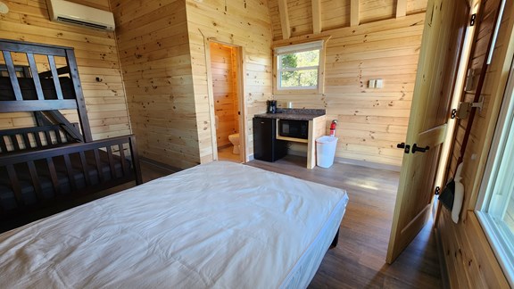 Rustic Cabin Interior looking at kitchenette.