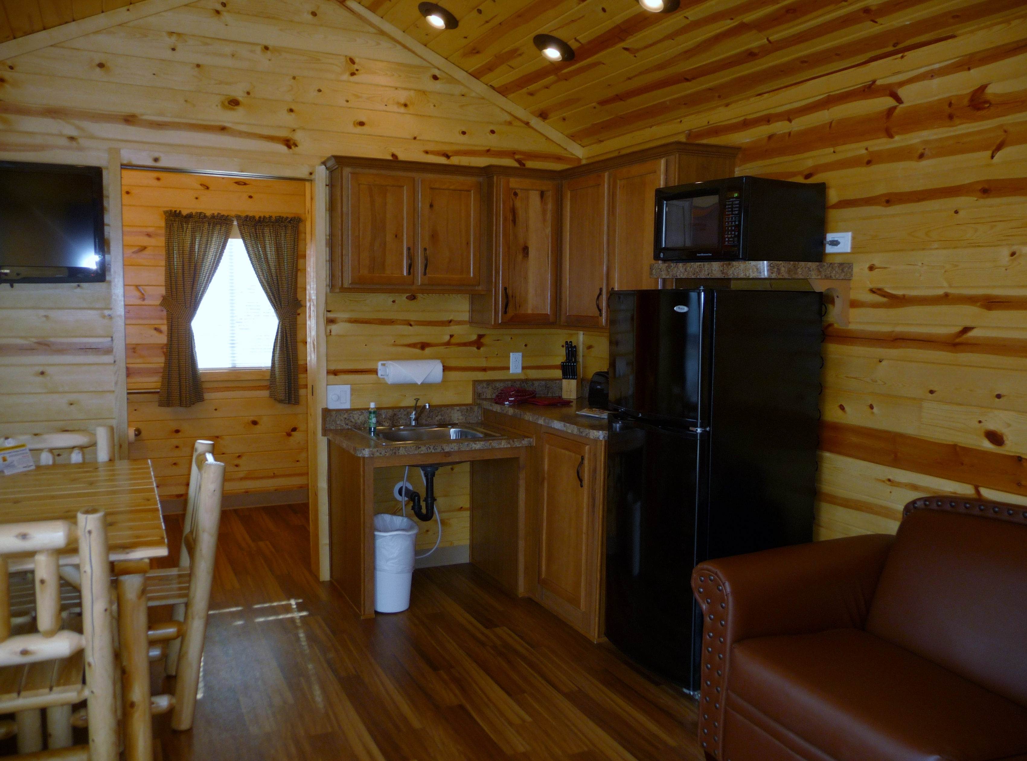 The kitchen and living room have many amenities to make your stay comfortable.