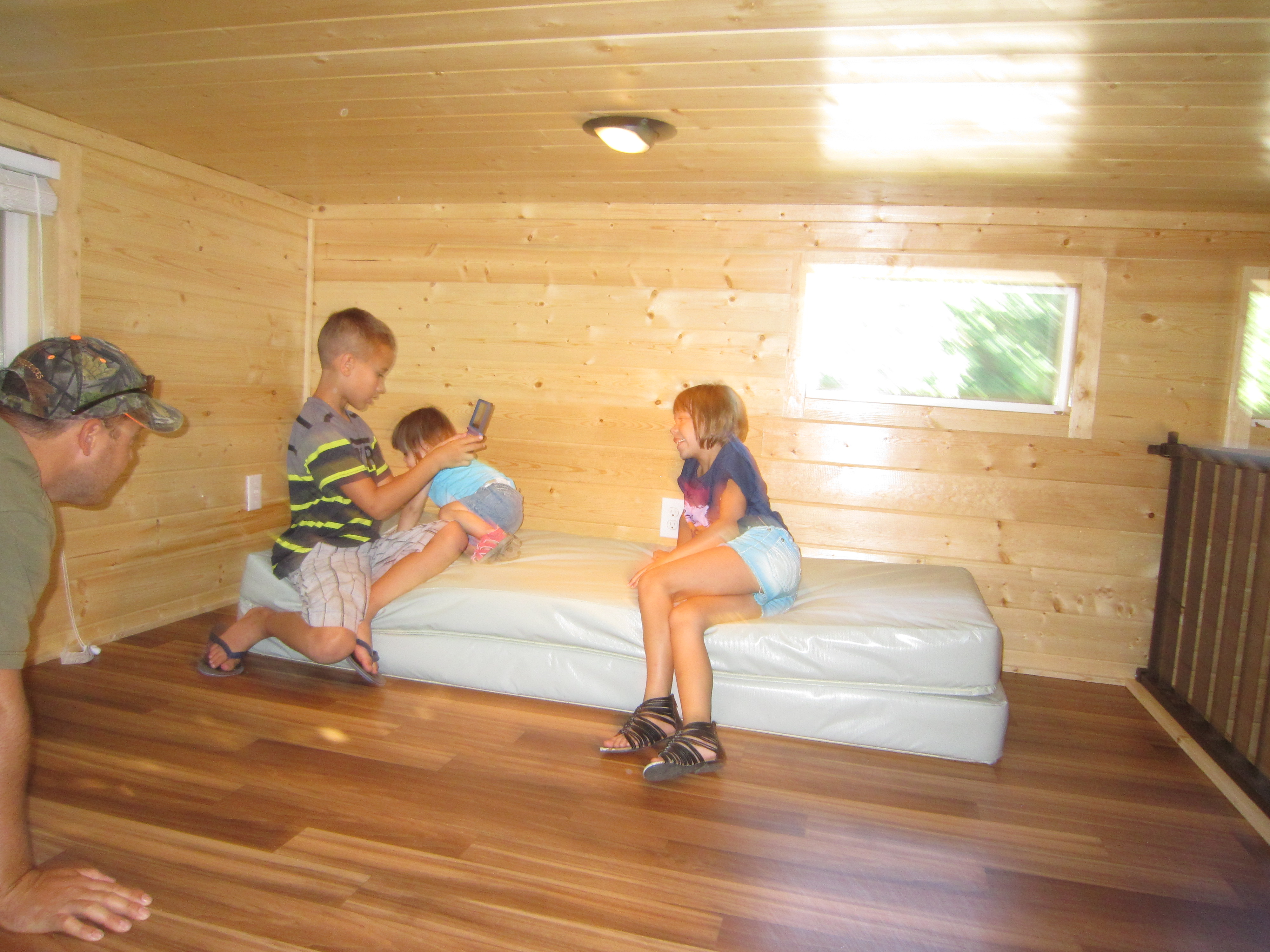 The sleeping loft is perfect for kids.