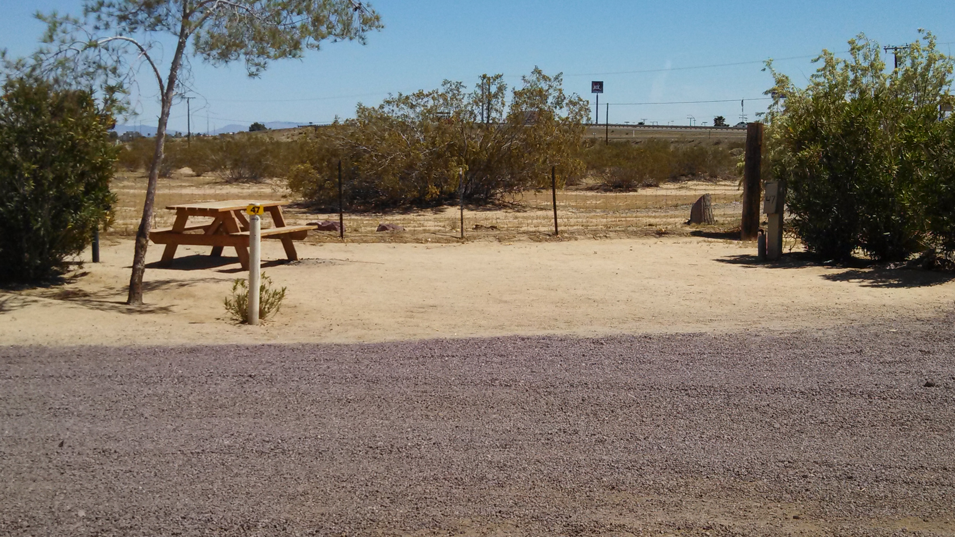30' site with landscape on either side. Close to pool, playground & restrooms.
