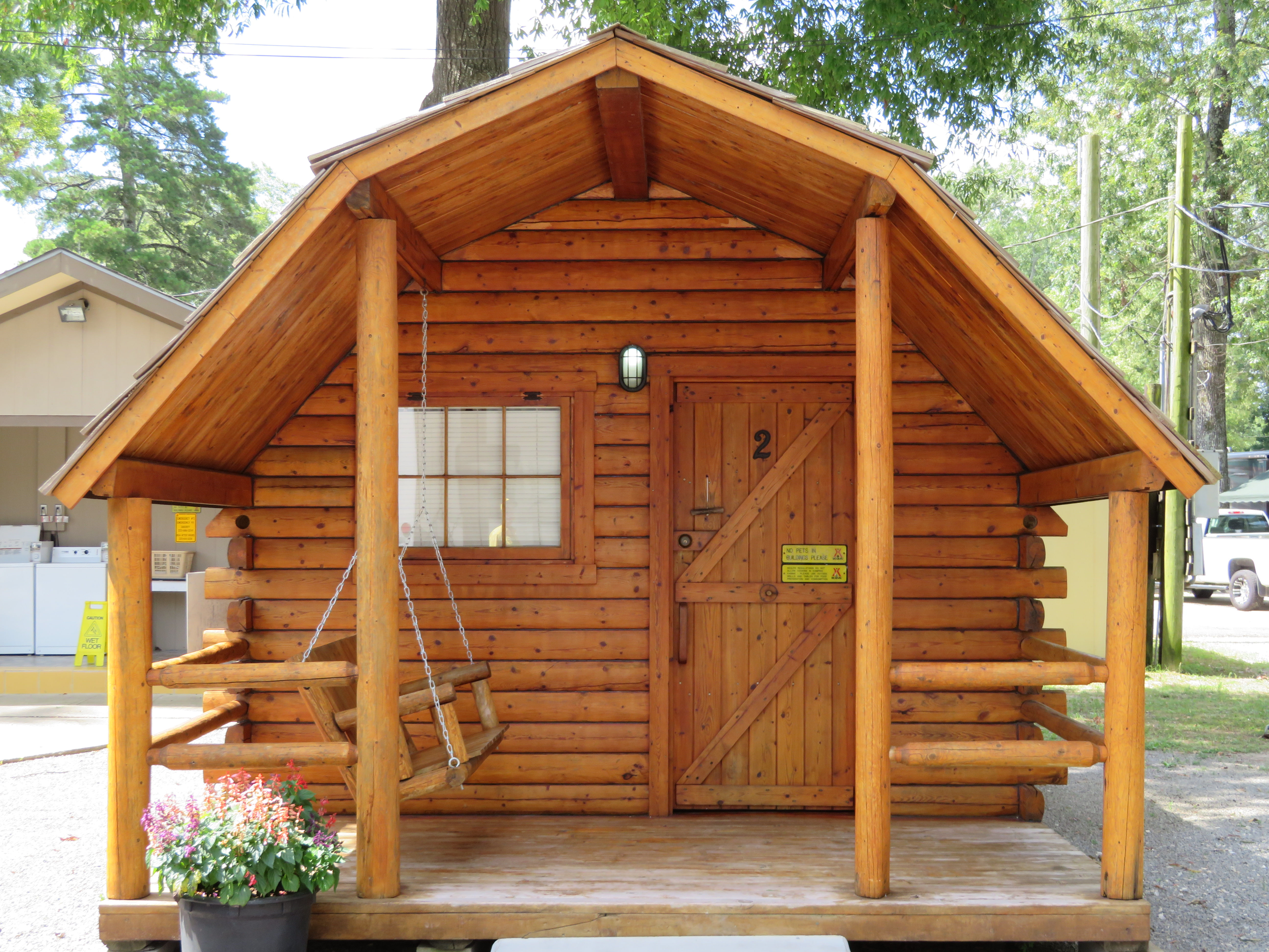 STAY IN ONE OF OUR 1 ROOM CAMPING CABINS.THIS CABIN SLEEPS 4 WITH IT'S BUNK BEDS AND FULL SIZE BED.