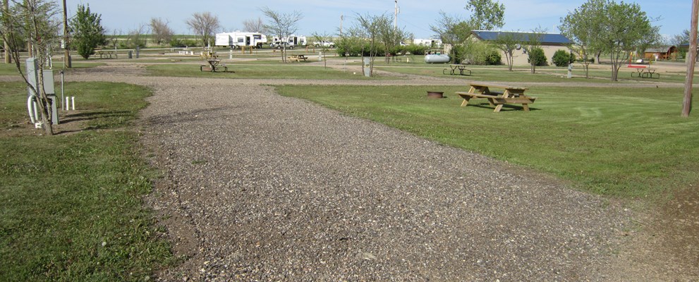 PULL THRU FULL HOOK UP SITE WITH GRAVEL SITE