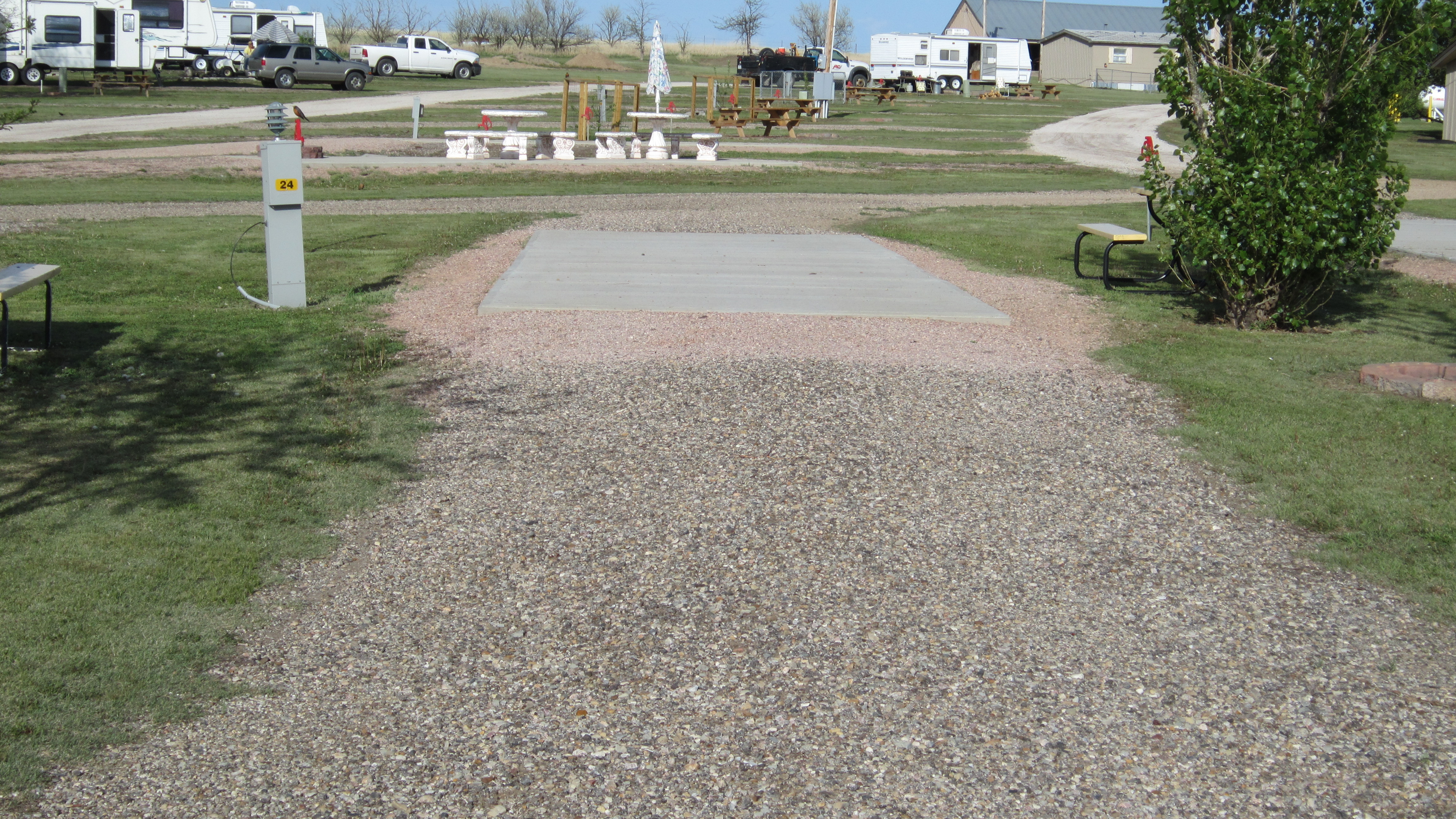 PULL THRU FULL HOOK UP SITE WITH CONCRETE PAD