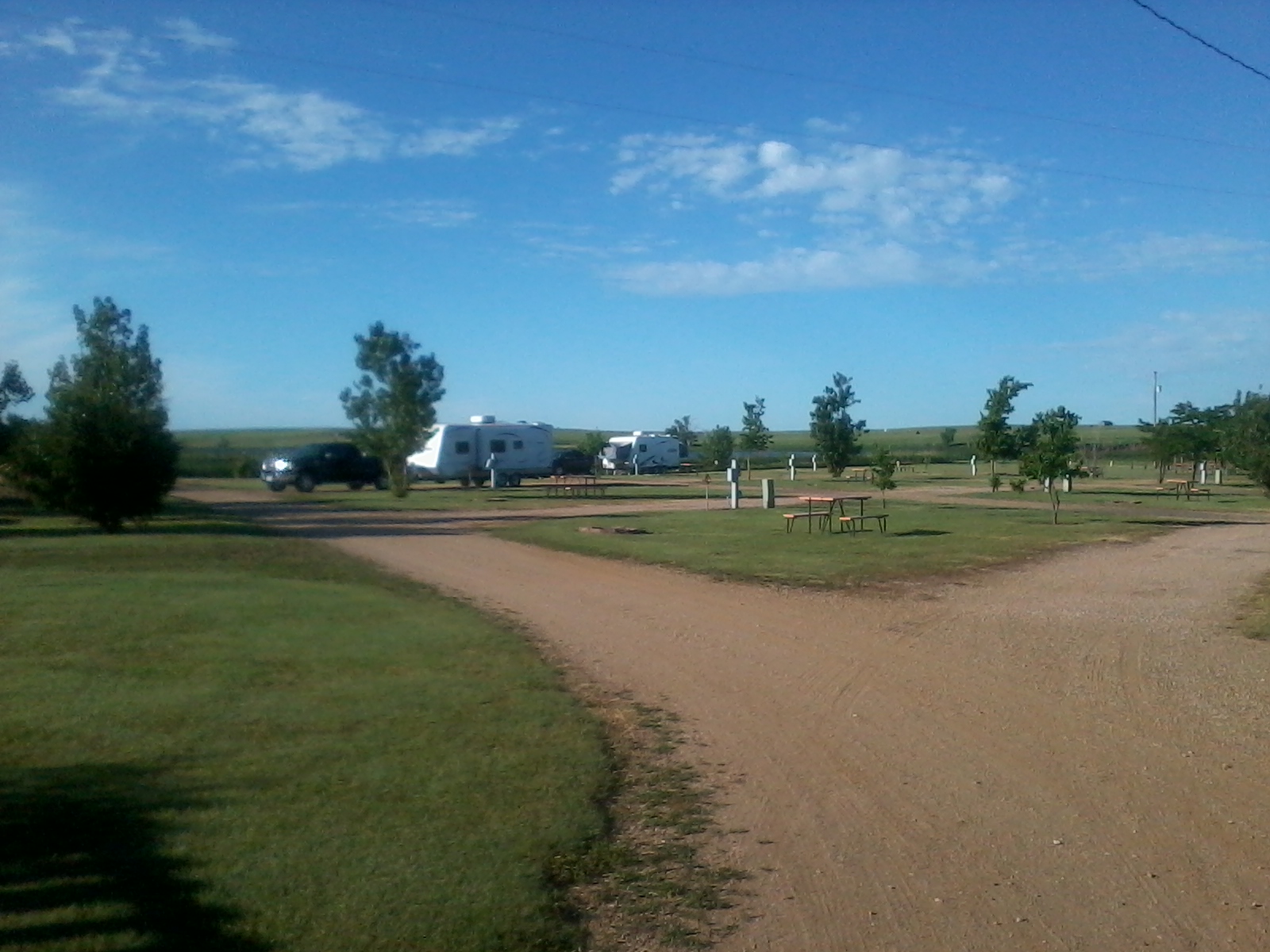 PULL THRU WATER & ELECTRIC SITE WITH GRAVEL SITE