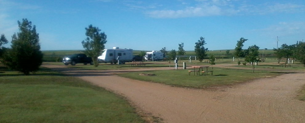 PULL THRU WATER & ELECTRIC SITE WITH GRAVEL SITE