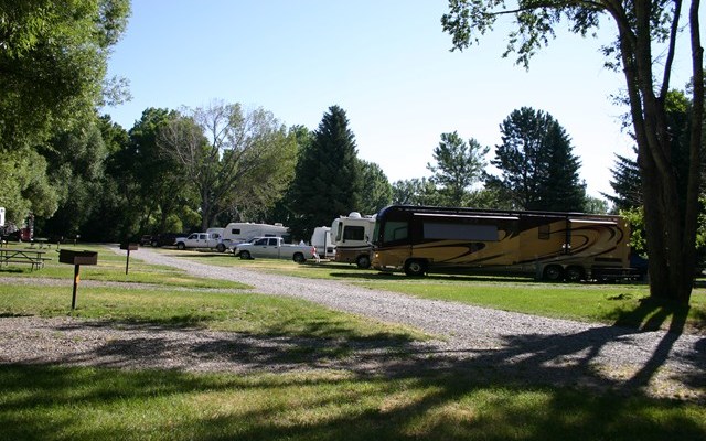 Full pull through 50 Amp water, electric and sewer RV site.
