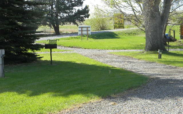 Nicely shaded 30 Amp water and electric RV site.
