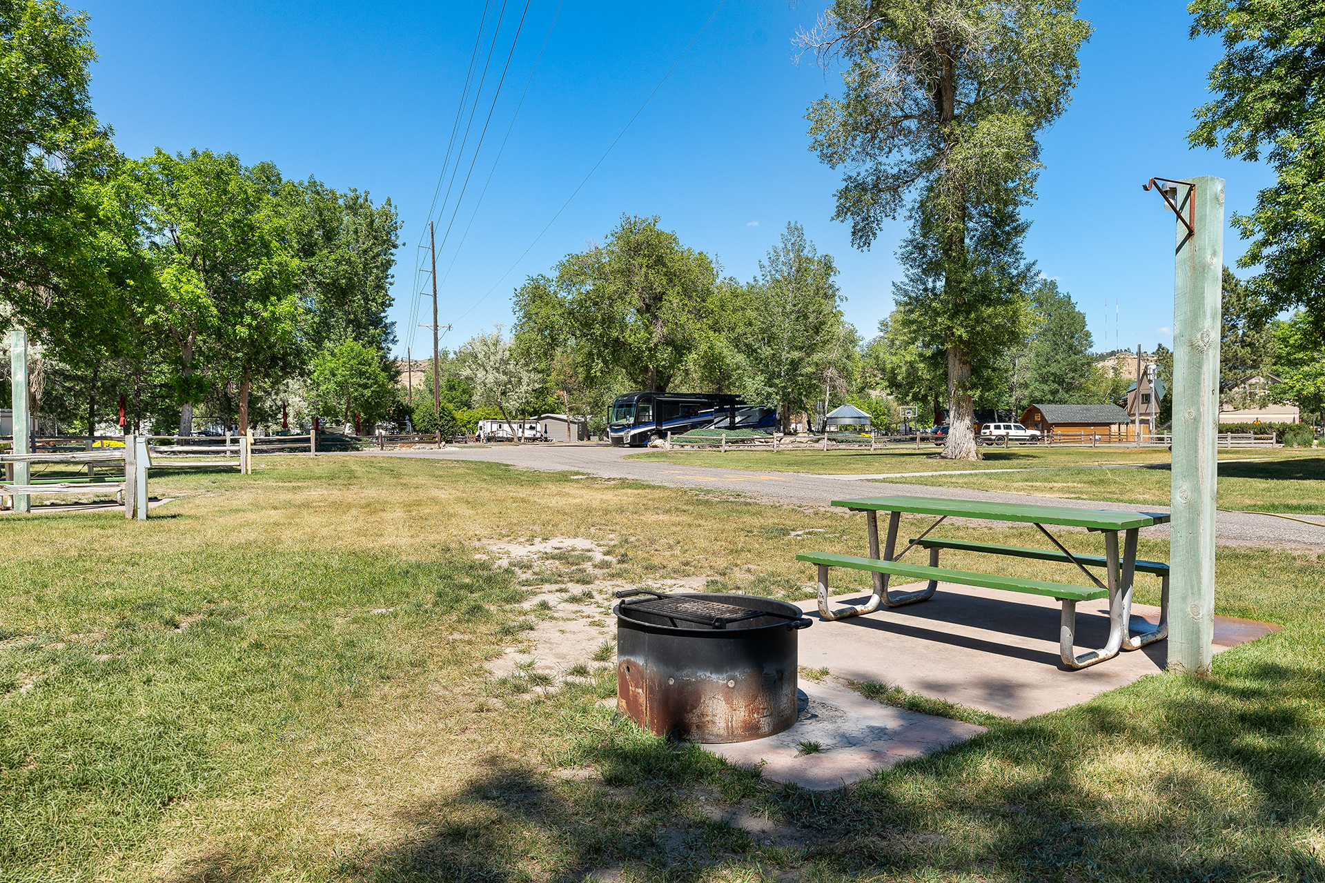 T03, Tent Site - Water + Electric with Patio, Grass Pad