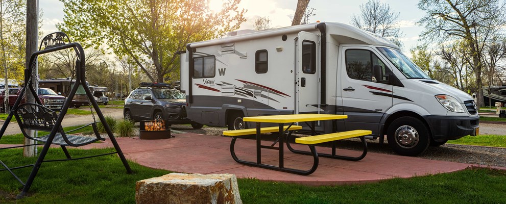 Upgrade your stay and camp in style by choosing one of our deluxe water & electric pull thru sites. These sites are a great option for those who are looking for a quick overnight stop, but still want the luxury of a spacious patio and fire ring.