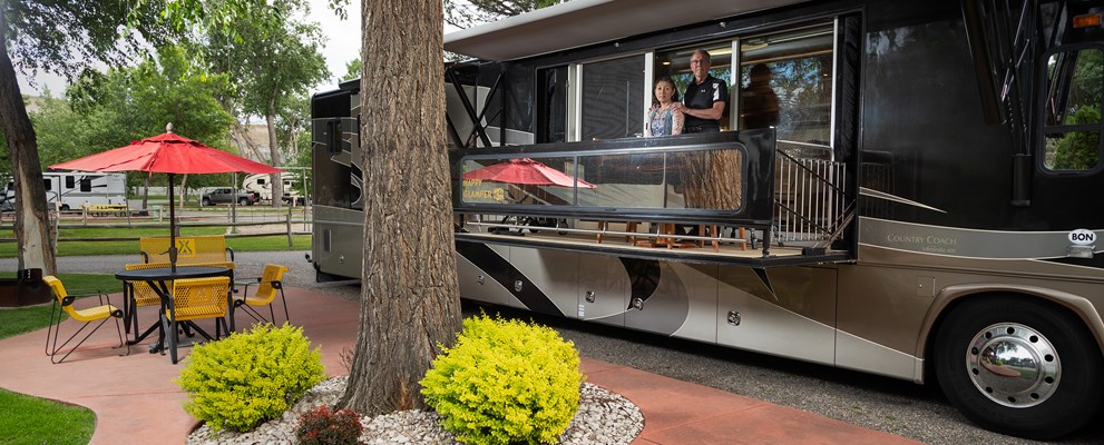Our deluxe patio full hook up sites (1-12). are larger and more spacious than our basic pull thru full hook up sites.  They are a great option for RVs sporting slideouts,  families who desire extra space, and pet owners who want to give their furry friends more area to roam.