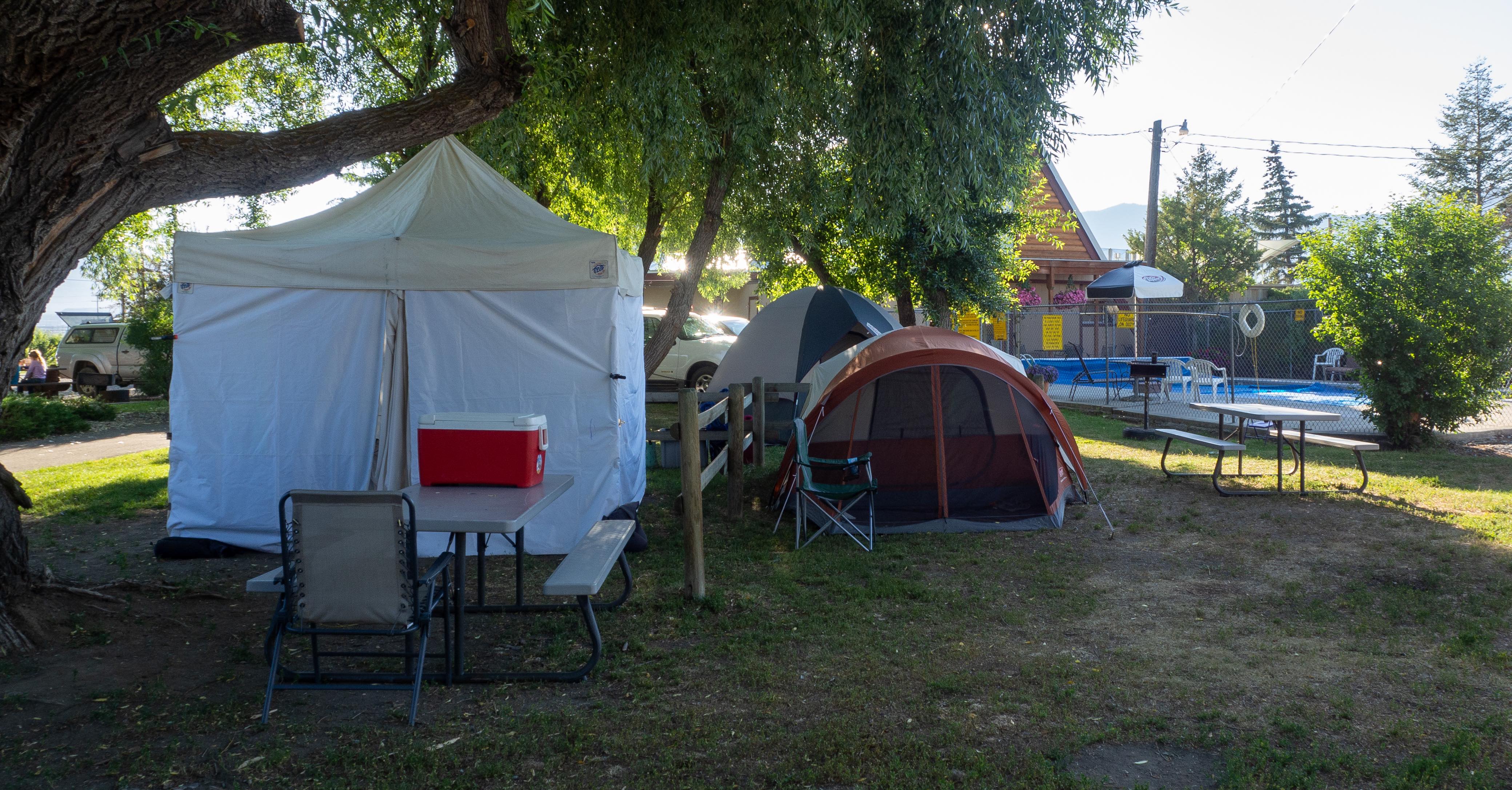 Shaded poolside tent sides.