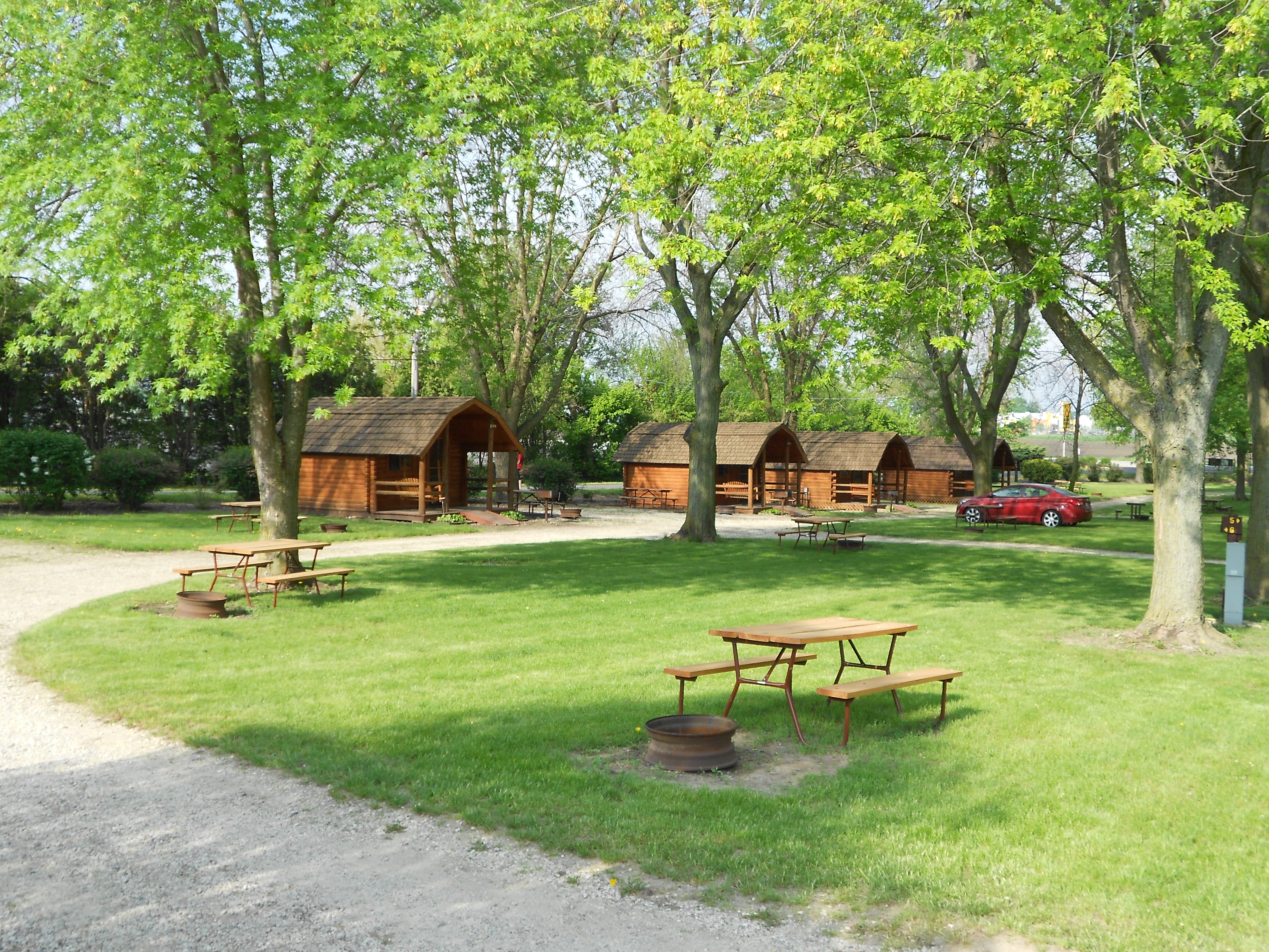 Rustic cabins near the tent sites.