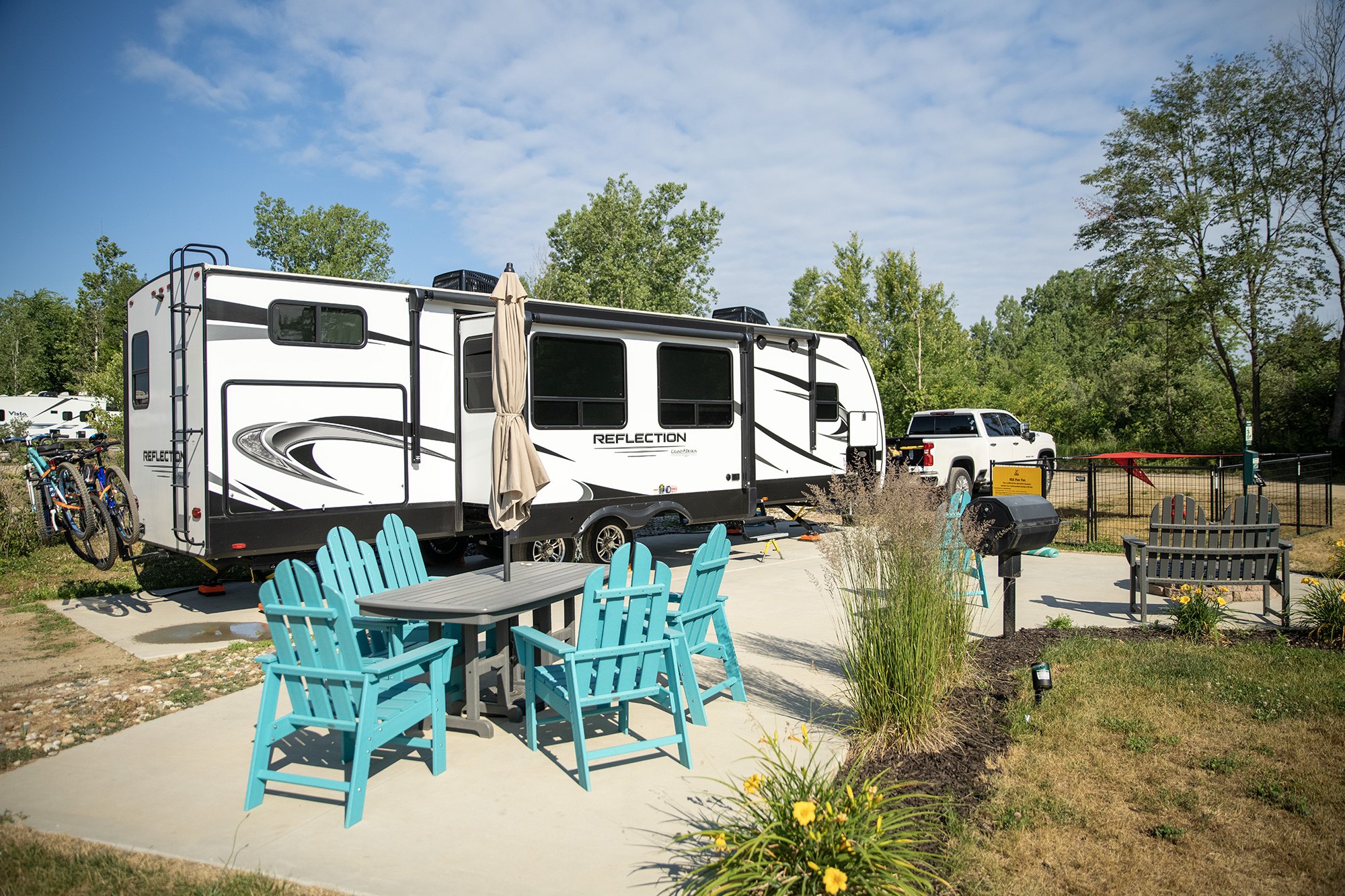 RV 145 - Pull Thru 50/30 AMPS FHU with Patio & KOA Paw Pen