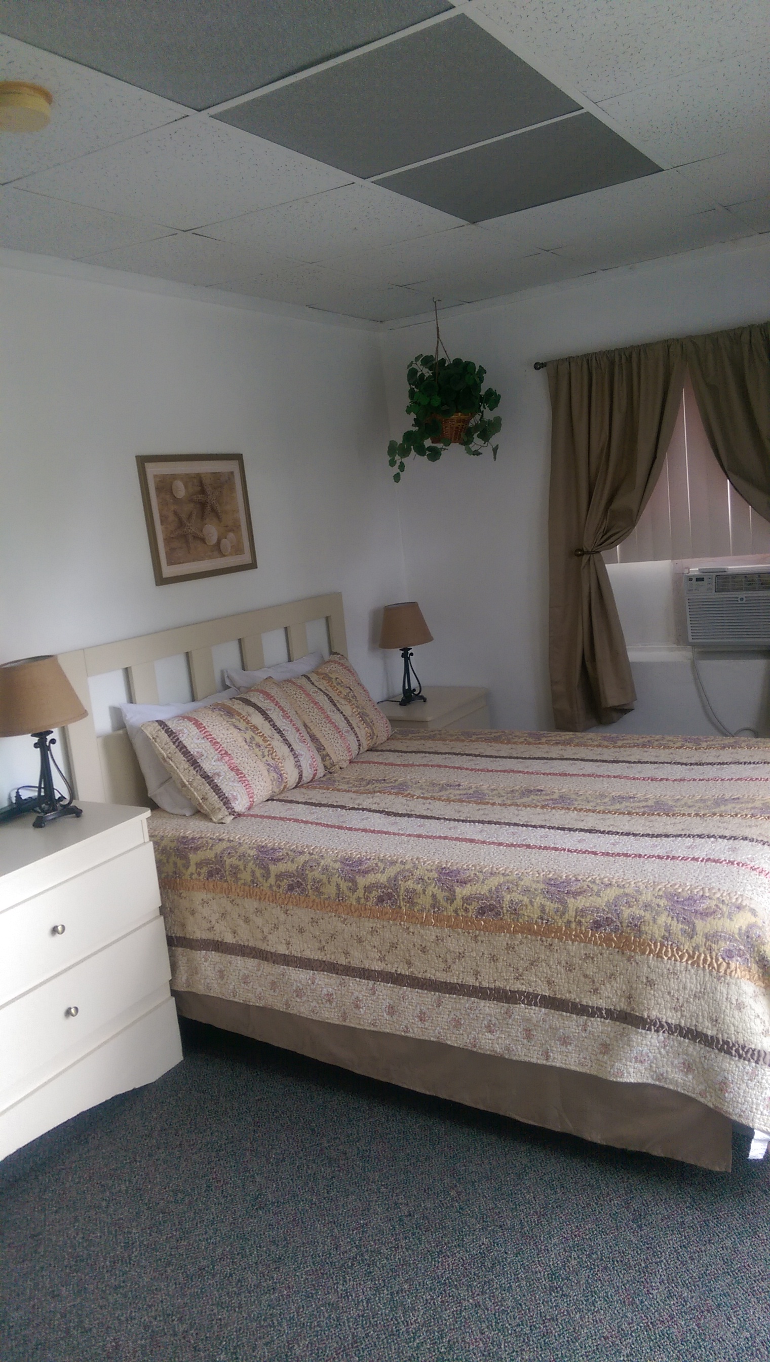 Motel Room with Shared Bath Down Hall