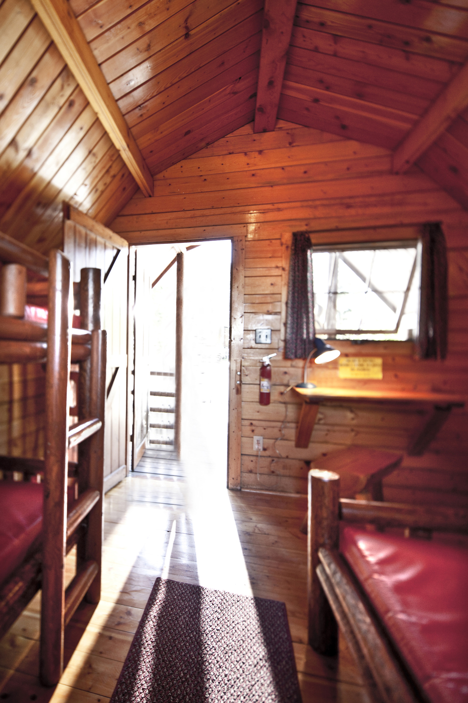 Rustic 4-person cabin interior - photo by Kampgrounds of America, Inc.
