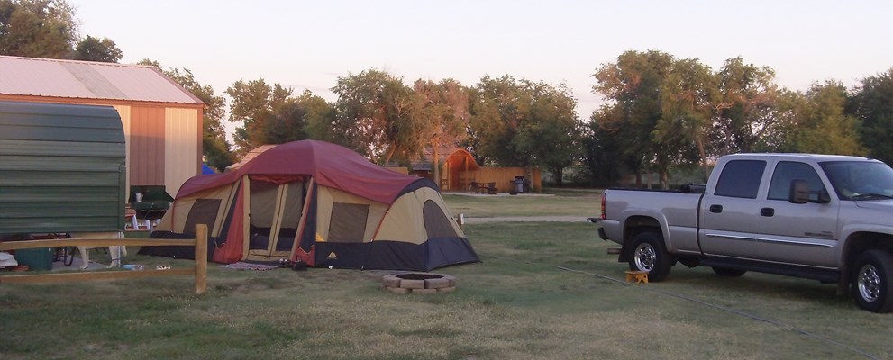 Tent sites have a shade awning fire pit and picnic table for our guests to enjoy.