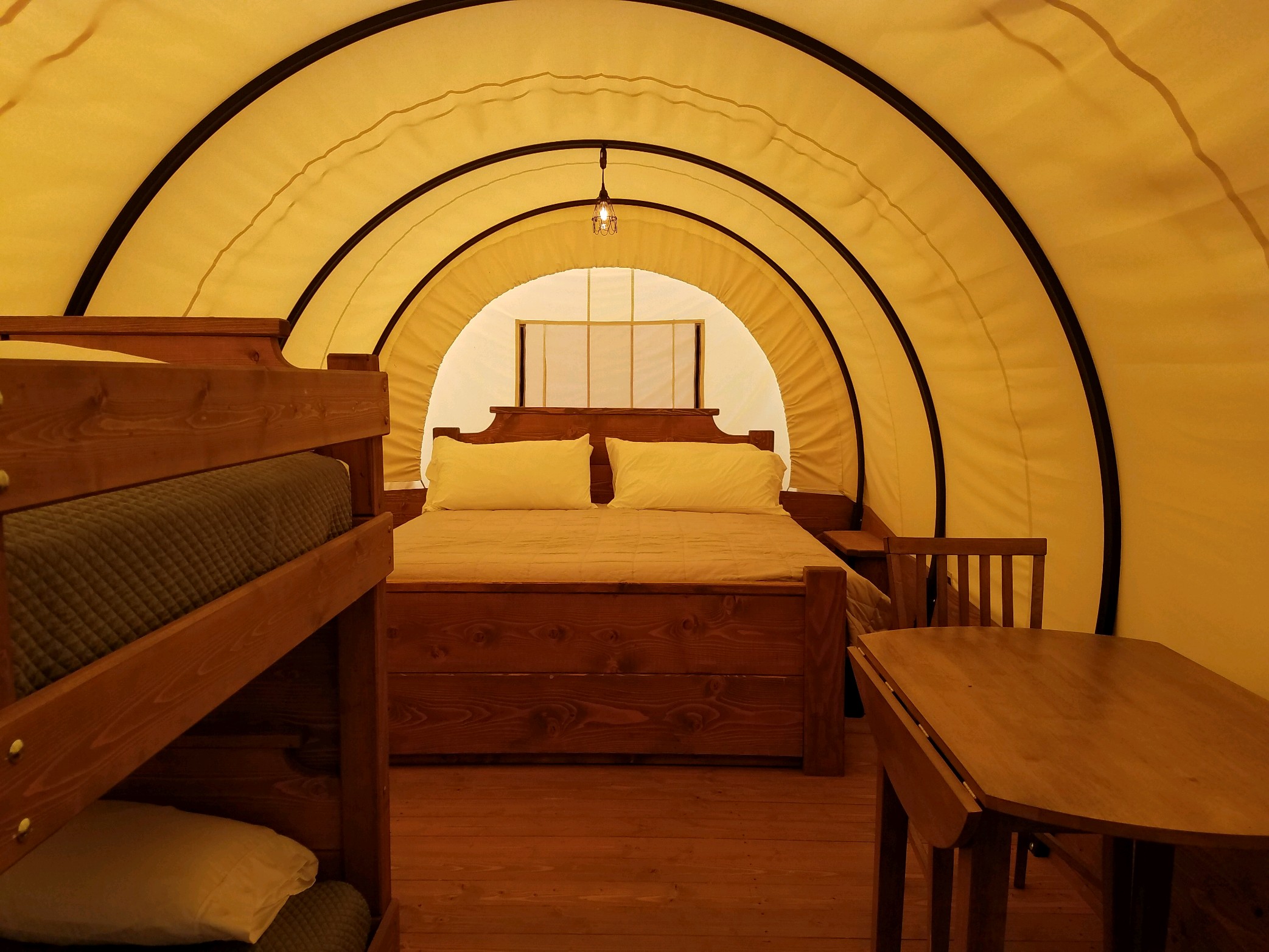 Wagon king bed and bunk beds