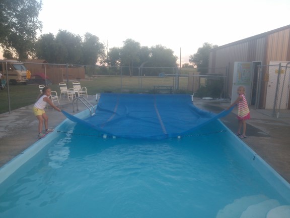 At dusk covering the pool