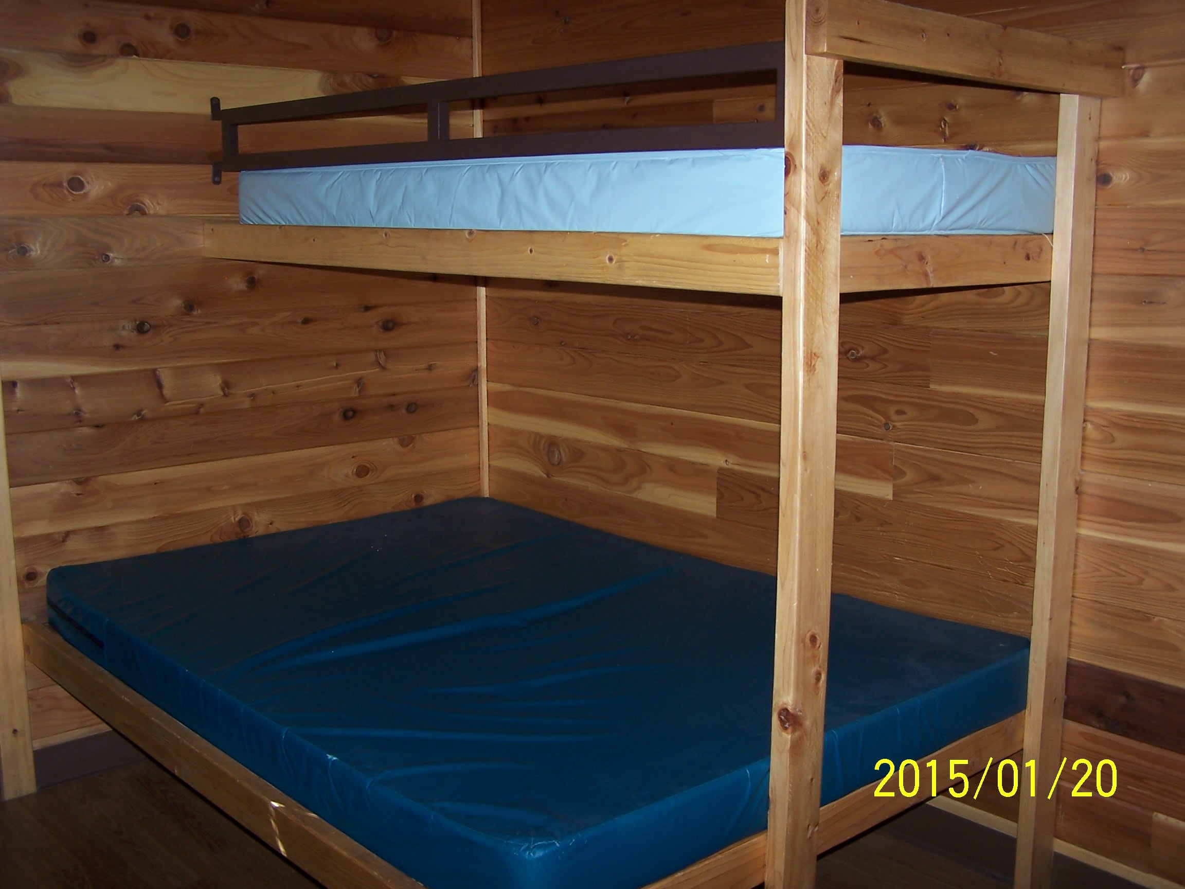 Double bed with upper bunk