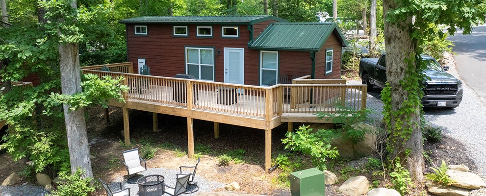 DC3 - Deluxe Cabin, 1 Room with Loft and KOA Patio® - Accessible