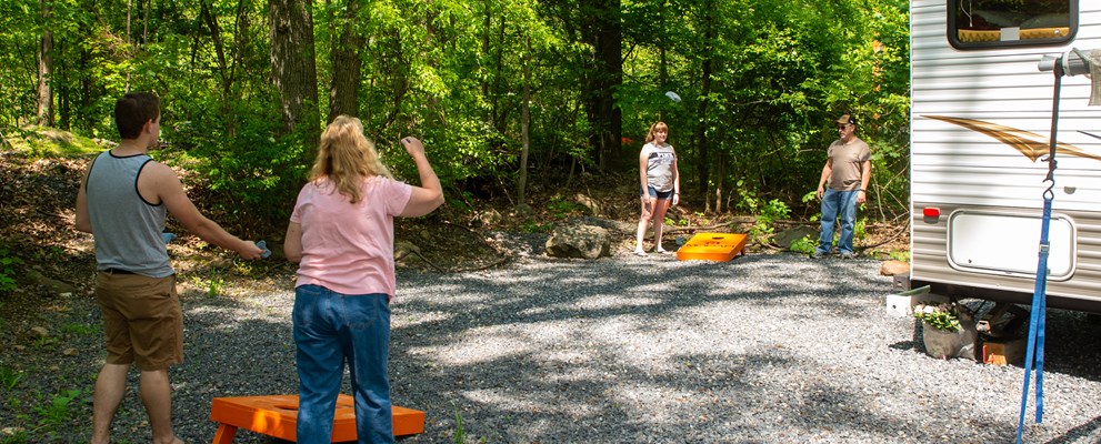Playing corn hole at the site