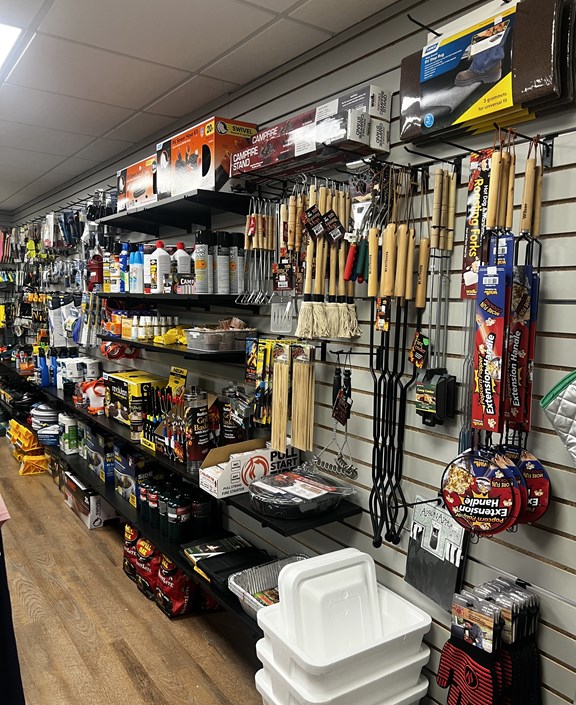 Camping gear and essentials wall display at Gettysburg KOA campstore