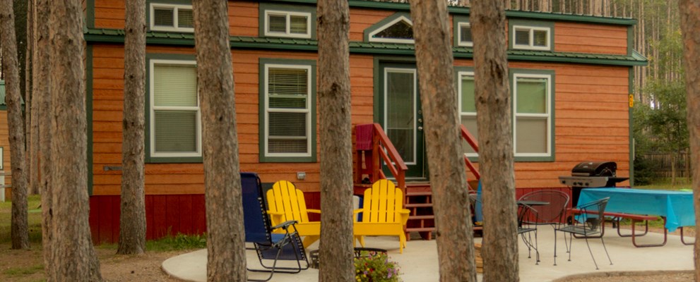Come enjoy luxury in the north-woods.  These spacious deluxe cabins come in a variety of floor-plans and kitchen set ups.  They all have sleeping lofts, satellite TV, sleep 8 people and have a patio with fire rings, tables and seating.  Family fun ready!