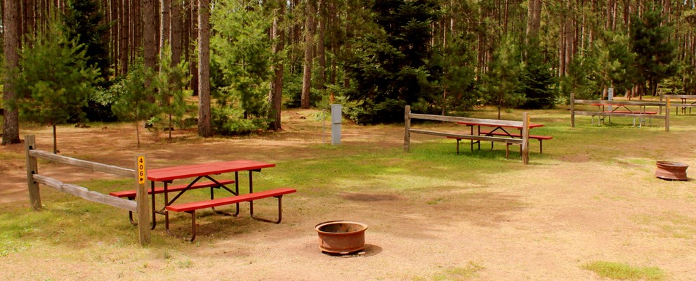 Our beautiful, clean RV sites accommodate every type of camper.  Back-ins, pull-throughs, full hookups or water/electric.  All are family ready with picnic tables, fire rings and the north-woods setting.  Choose your site today!