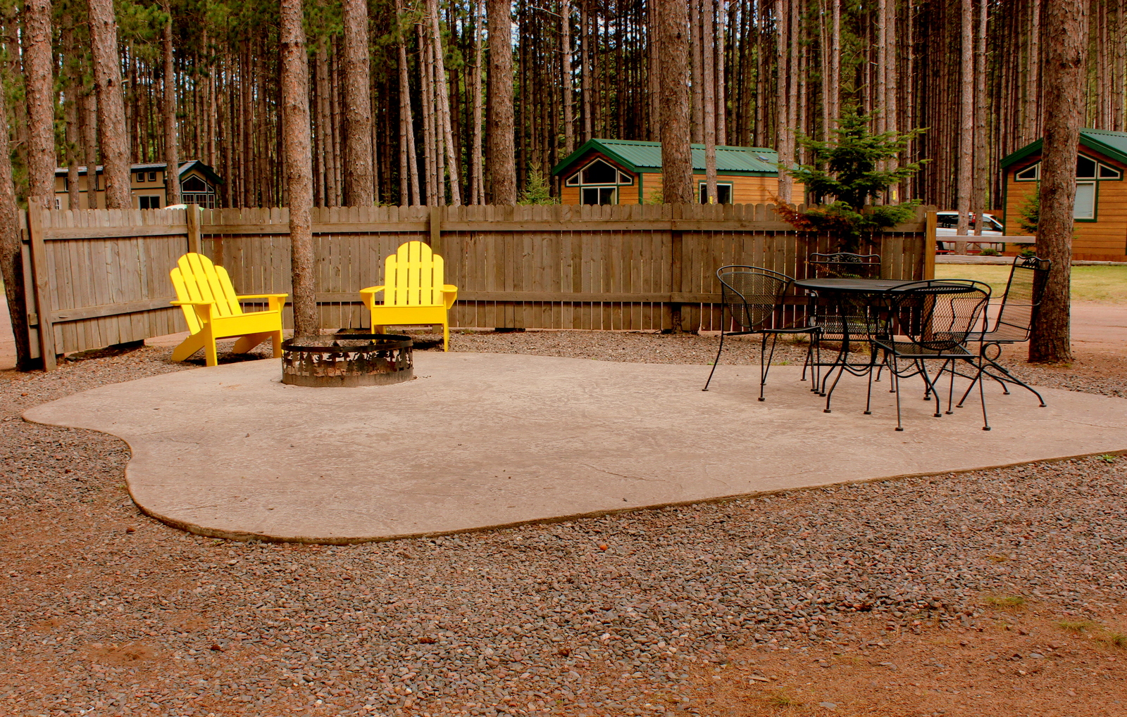 Patios, fire rings, seating and tables - our deluxe RV sites are the place to sit back and relax under the tall pines.  Back-ins or pull-throughs, your favorite space awaits!