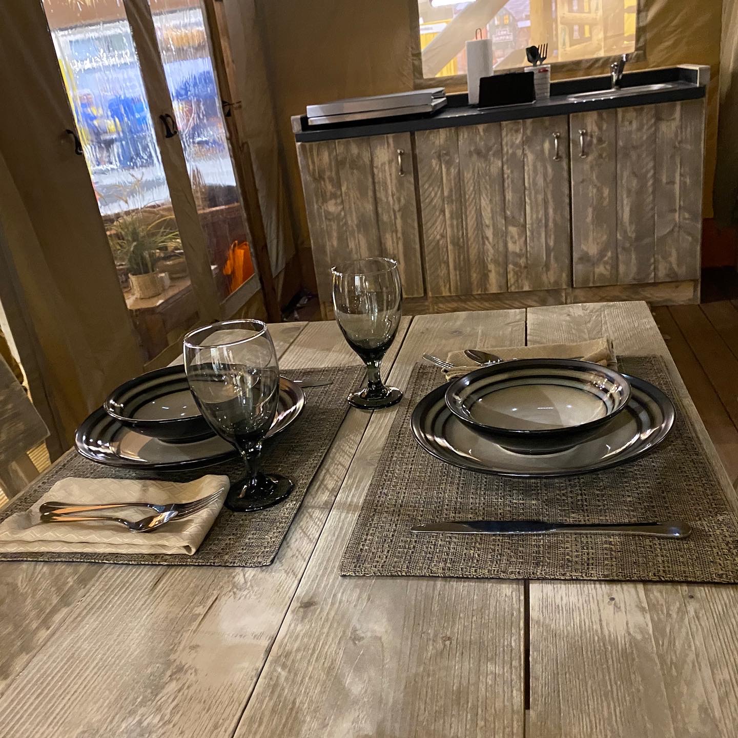 Dining table and partial kitchen