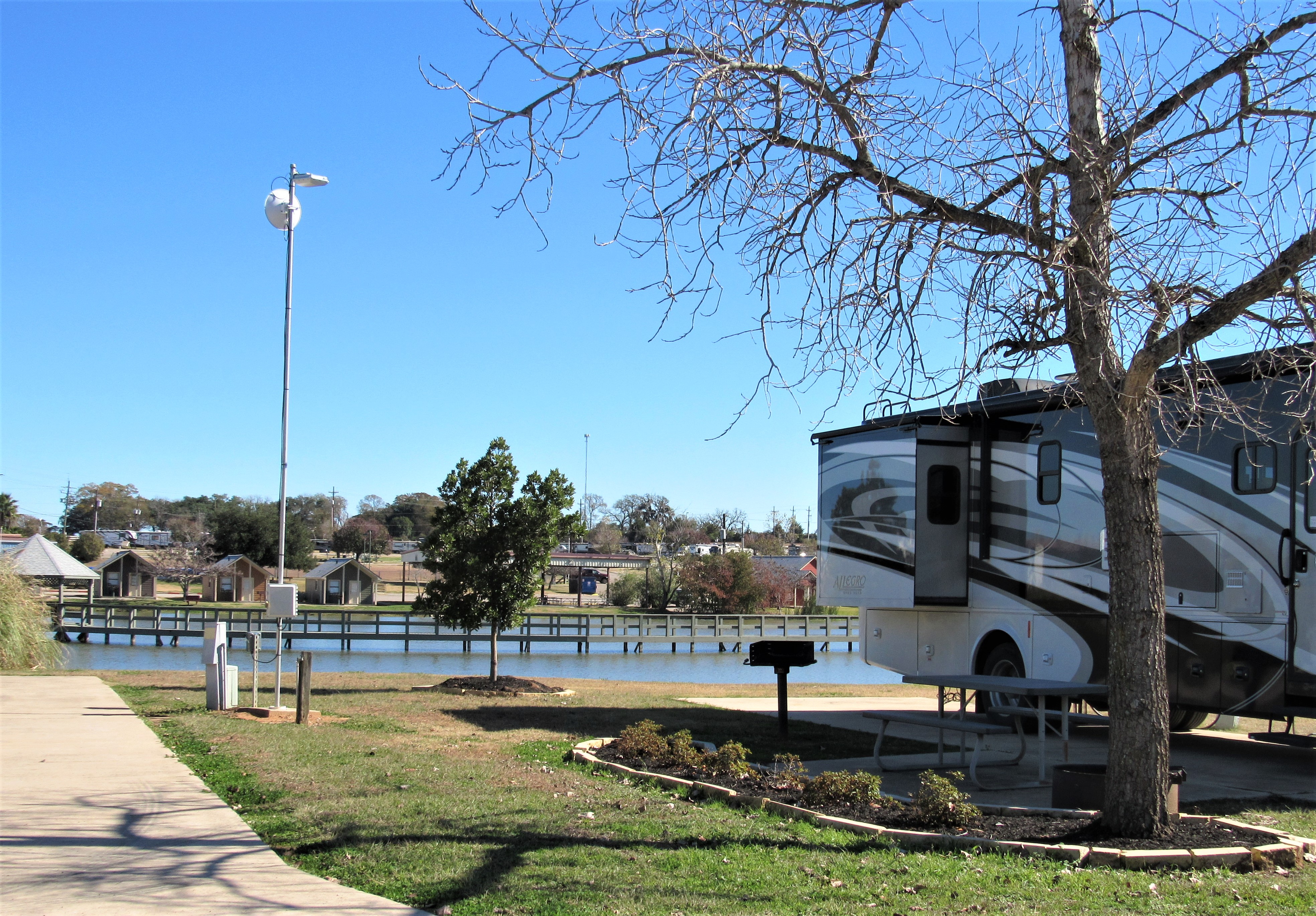 Lakeside sites back up to our stocked fishing pond