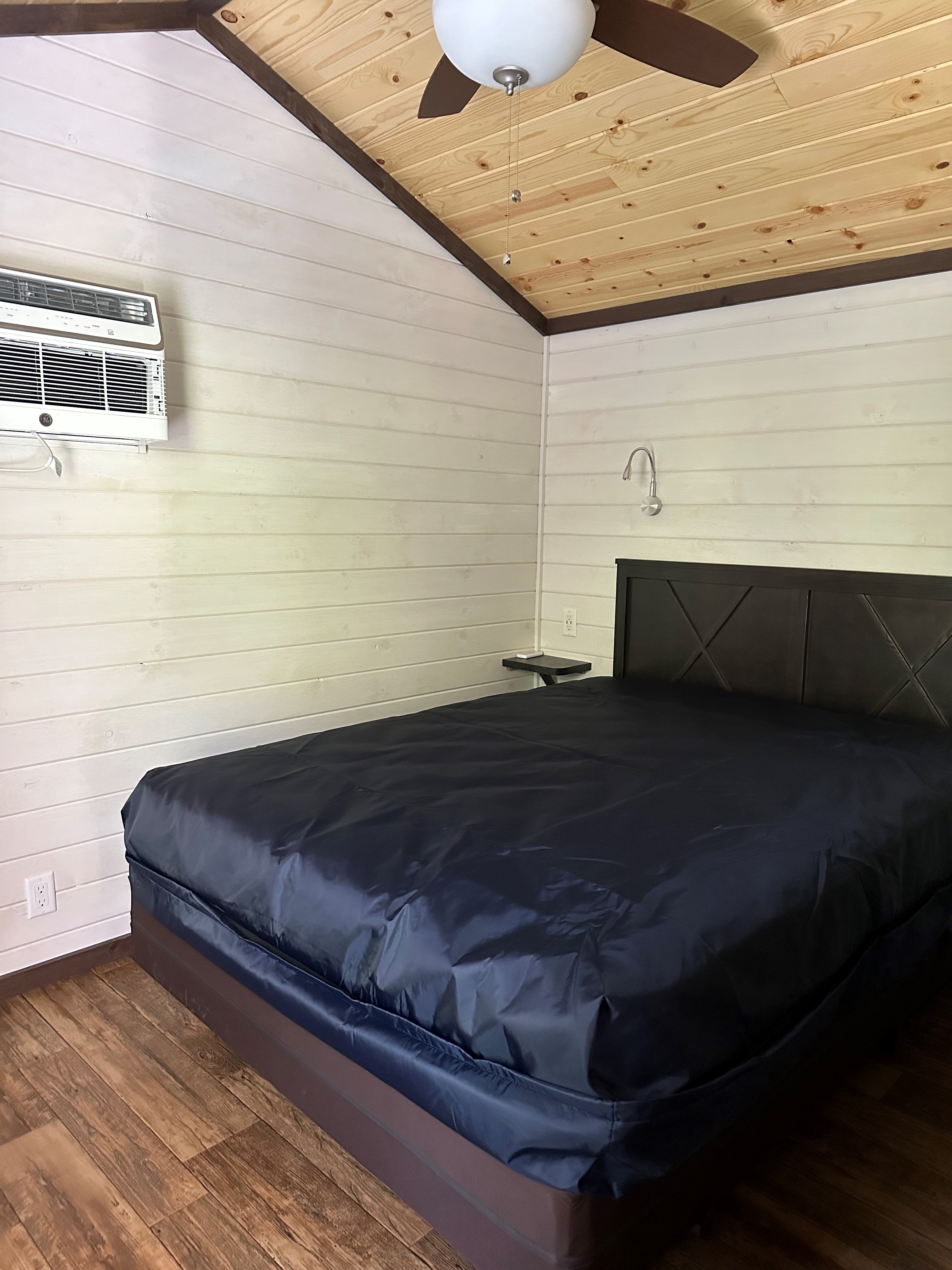 Cabins L50 & L203 Separate Queen Bedroom next to full bath/shower.