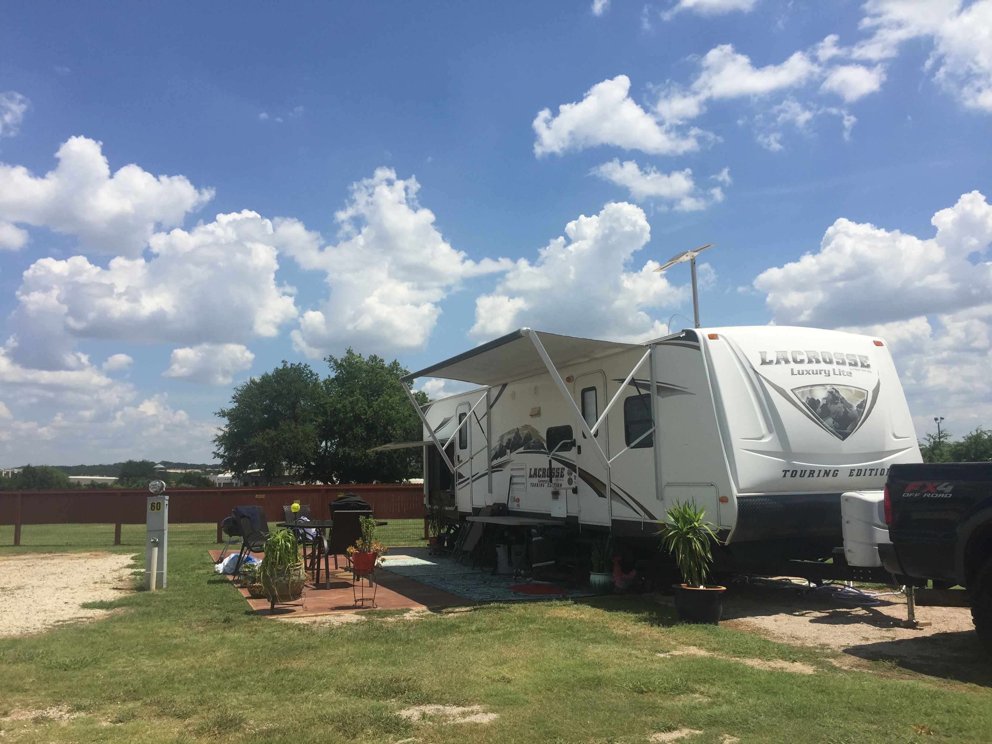 Premium Paved Back in Site with Full Hook ups and patio. Backs to Pet Run.