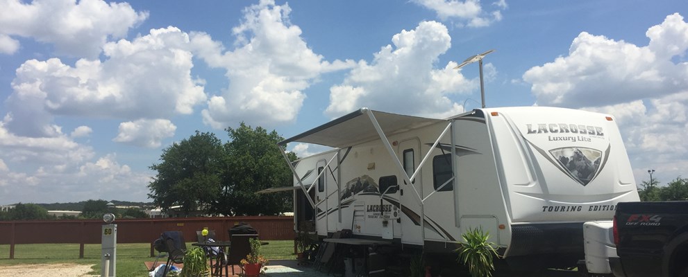 Premium Paved Back in Site with Full Hook ups and patio. Backs to Pet Run.