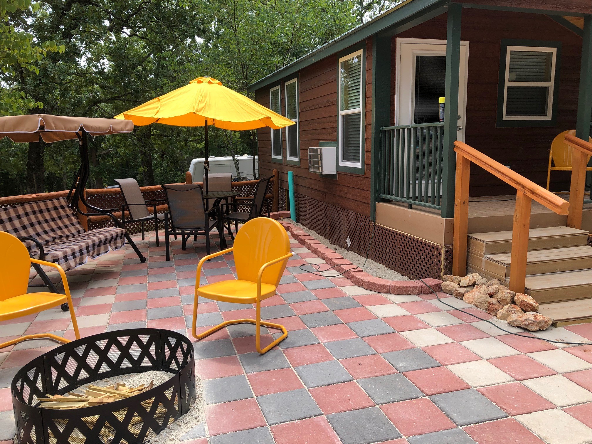 Deluxe Cabin (w/ Bathroom) Stay at our new cabins that have a queen bed and full-size bunk bed. Kitchenette, air conditioner, TV, microwave, coffee maker, toaster, and a private bathroom. No Pets. Call us to book your reservation 573-346-5490.