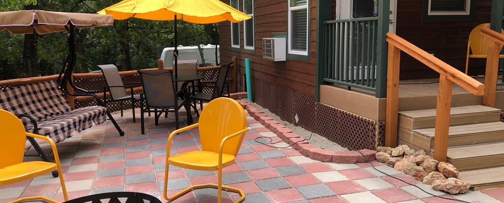 Deluxe Cabin (w/ Bathroom) Stay at our new cabins that have a queen bed and full-size bunk bed. Kitchenette, air conditioner, TV, microwave, coffee maker, toaster, and a private bathroom. No Pets. Call us to book your reservation 573-346-5490.